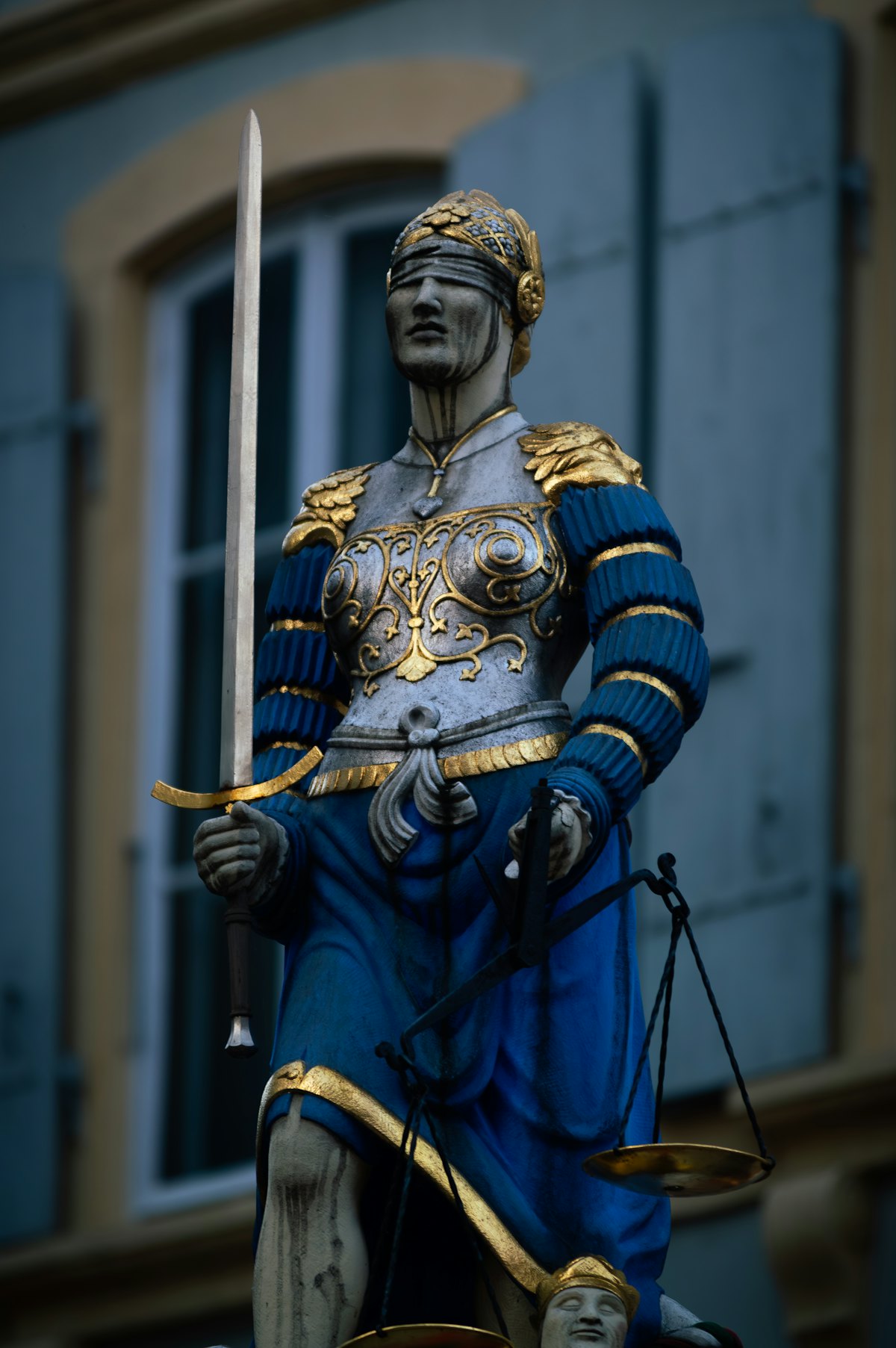 Statue of Lady Justice holding the scales of justice.
